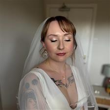 Sparkly eyeshadow with winged eyeliner