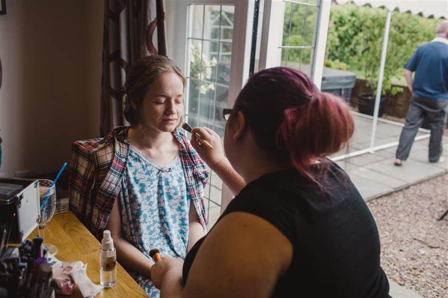 Ms Moo applying wedding morning makeup