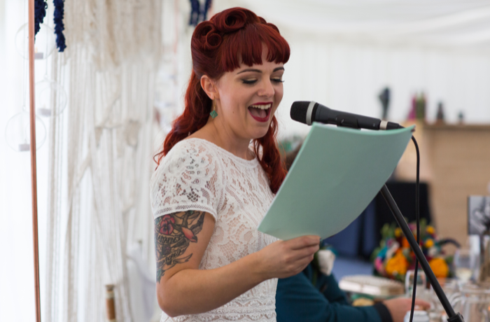 Singing bride at wedding reception by Shot by Amy