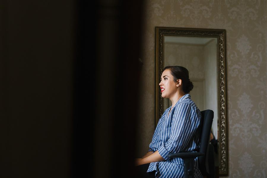 Smiling bride at The Walled Garden Beeston by Emily & Katy Photography