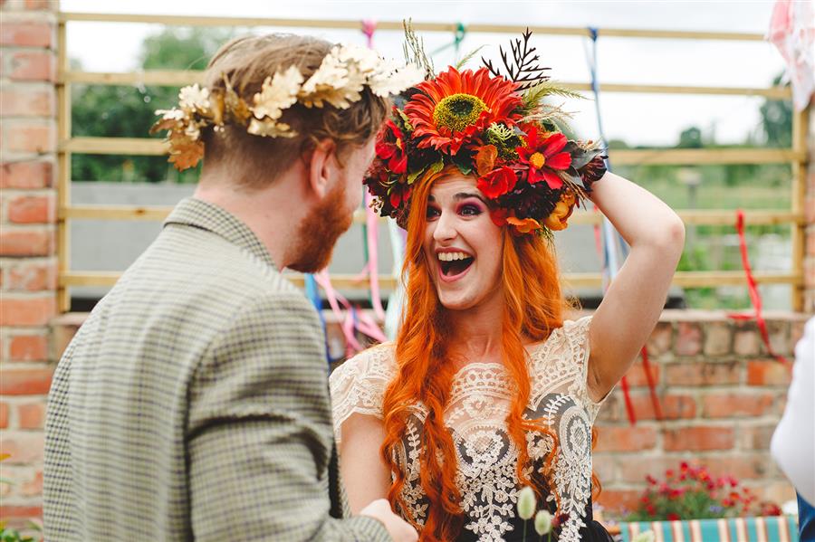 Happy bride with flower crown from CC Millinery Creations