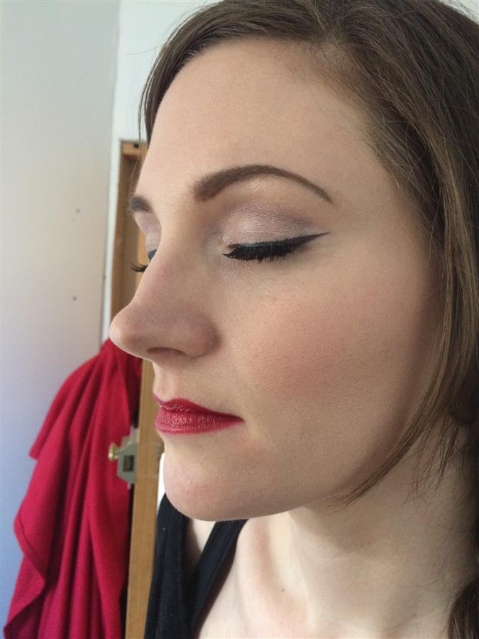 Vintage wedding makeup trial with red lipstick and black eyeliner flick