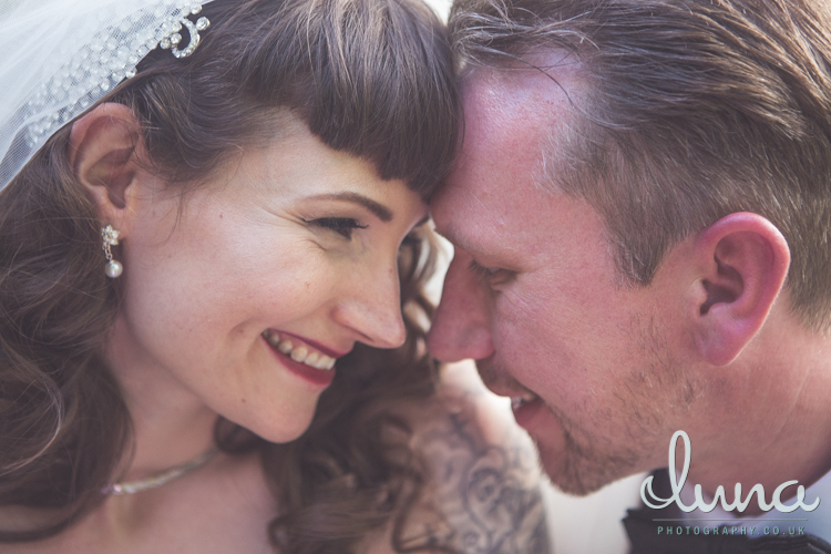 Happy bride and groom portrait at Breadsall Priory by Luna Photography